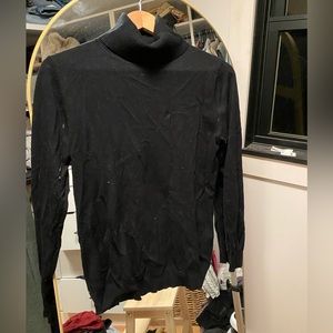 Black turtle neck sweater